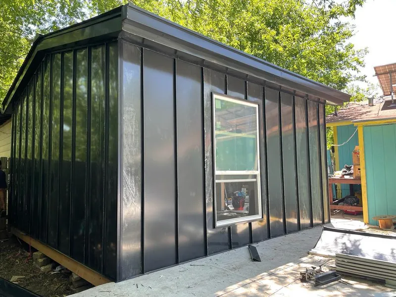 Black standing seam metal wall panels for Metal Roof Installation in Stratmoor